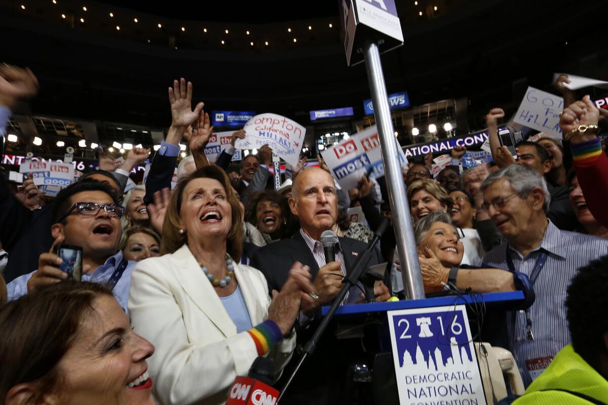 House Minority Leader Nancy Pelosi, center left, and California Gov. Jerry Brown, center, at the Democratic National Convention in 2016.