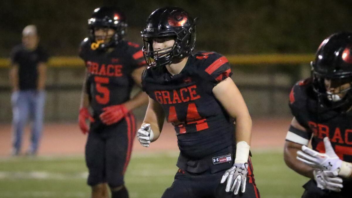 Grace Brethren middle linebacker Josh Henderson awaits a snap against Bishop Diego on Oct. 4.