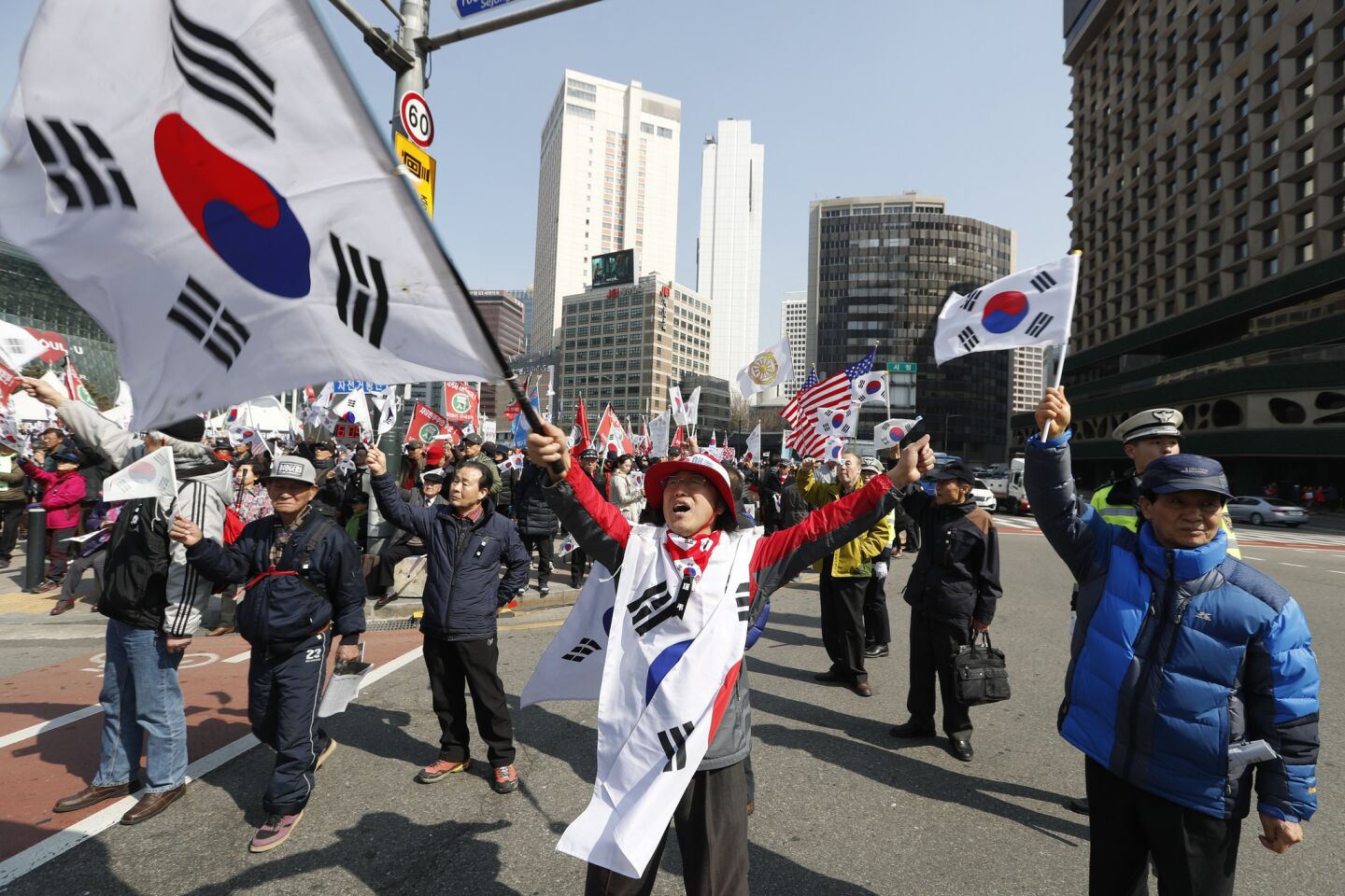 Supporters of former South Korean President Park Geun-hye protest her impeachment.