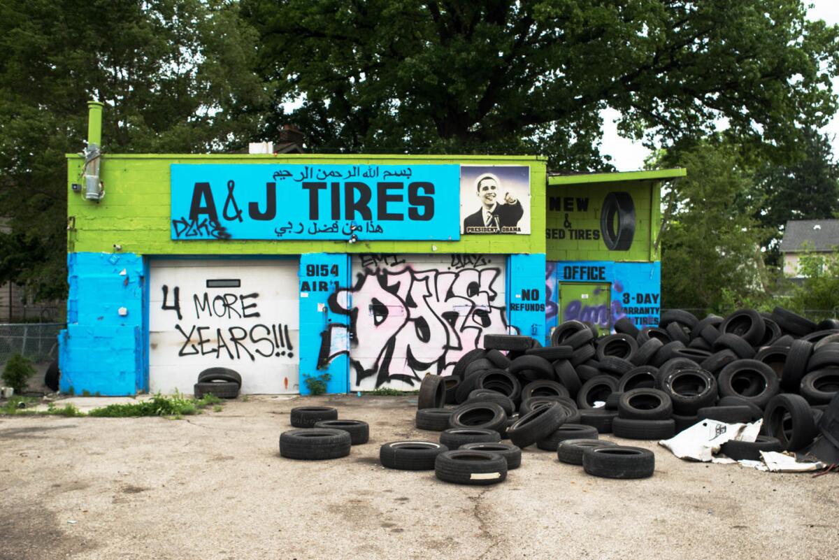 A. and J. Tires, 9154 Livernois Ave., Detroit, 2014 (above) and 2015 (right)