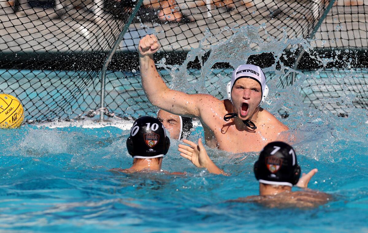 Newport Harbor senior Will Fosselman reacts after scoring a goal against Huntington Beach during the first half Saturday.