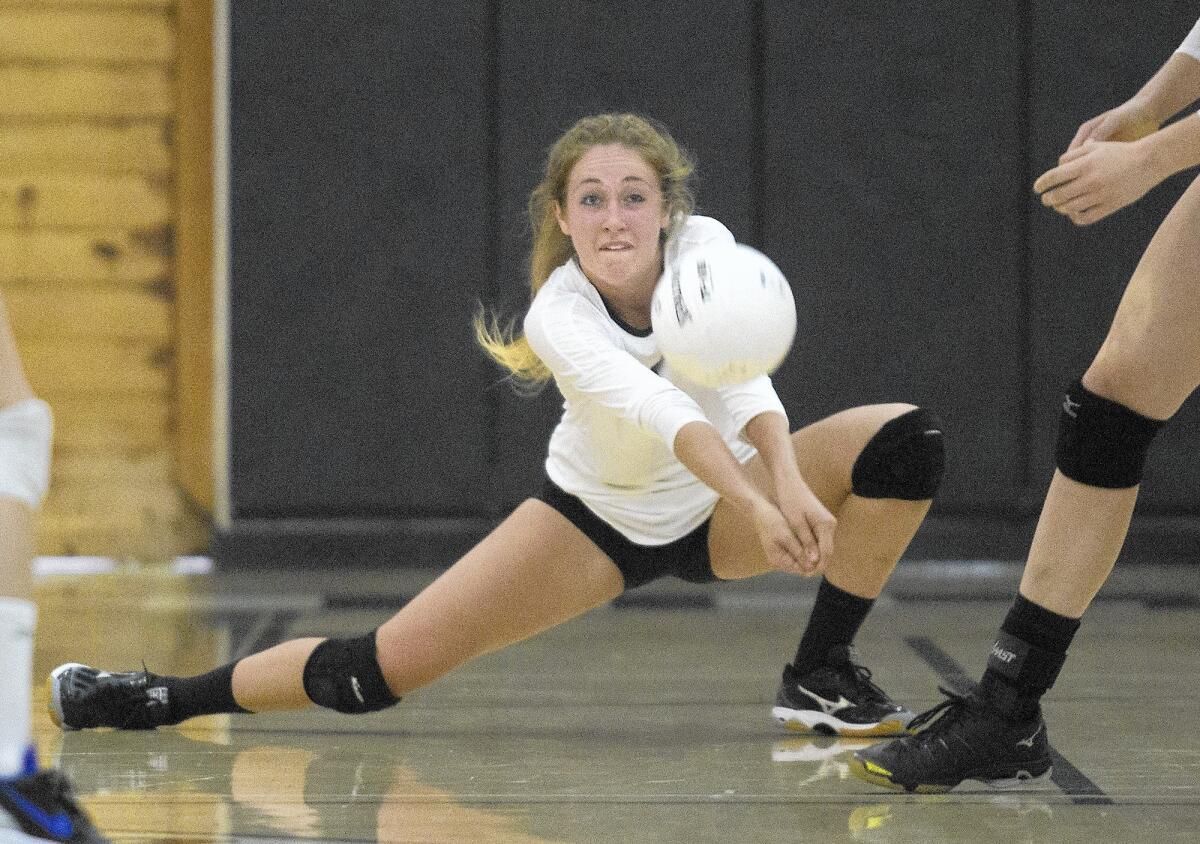 NEWPORT BEACH, CA, September 15, 2015 -- Sage Hill School's Giordana Ricci goes low for a dig during the second set against Santa Margarita on Tuesday. (Kevin Chang/ Daily Pilot)