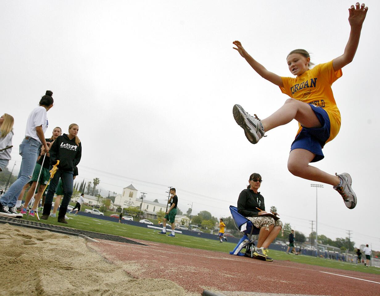 Jordan Middle School 6th grader Mikayla Gardner, 12, participates in the long jump event at the annual All-City Track and Field Meet at Burbank High School in Burbank on Saturday, April 13, 2013.