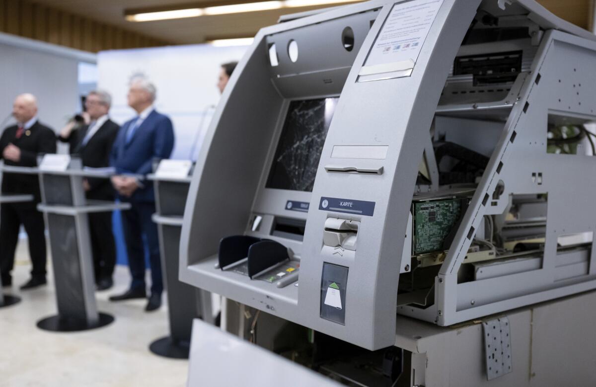 A blown-up ATM is displayed during a press conference at the State Criminal Police Office (LKA) in Munich, Germany, Thursday, Feb. 2, 2023. German authorities say that nine men suspected of involvement in blowing up dozens of cash machines in Germany and stealing some 5.2 million euros (nearly $5.7 million) have been arrested in the Netherlands and Belgium. (Sven Hoppe/dpa via AP)