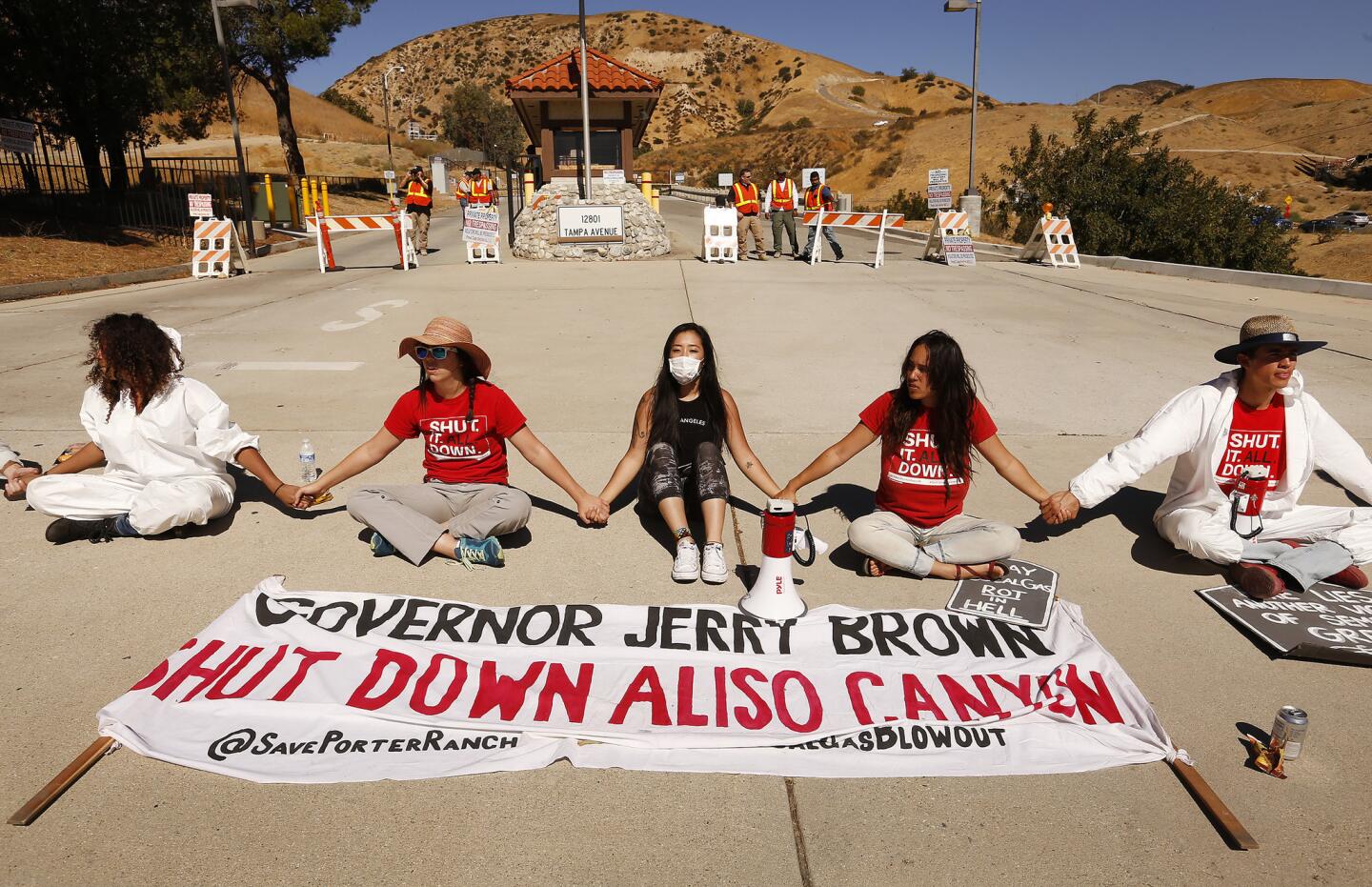 About 50 protesters and residents staged a sit-in at the Southern California Gas Co. Aliso Canyon facility in Porter Ranch on Monday, marking the two-year anniversary of a gas leak.
