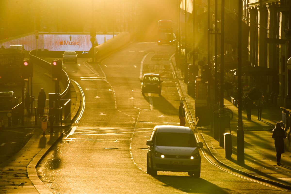 Moderate traffic as the sun sets in London