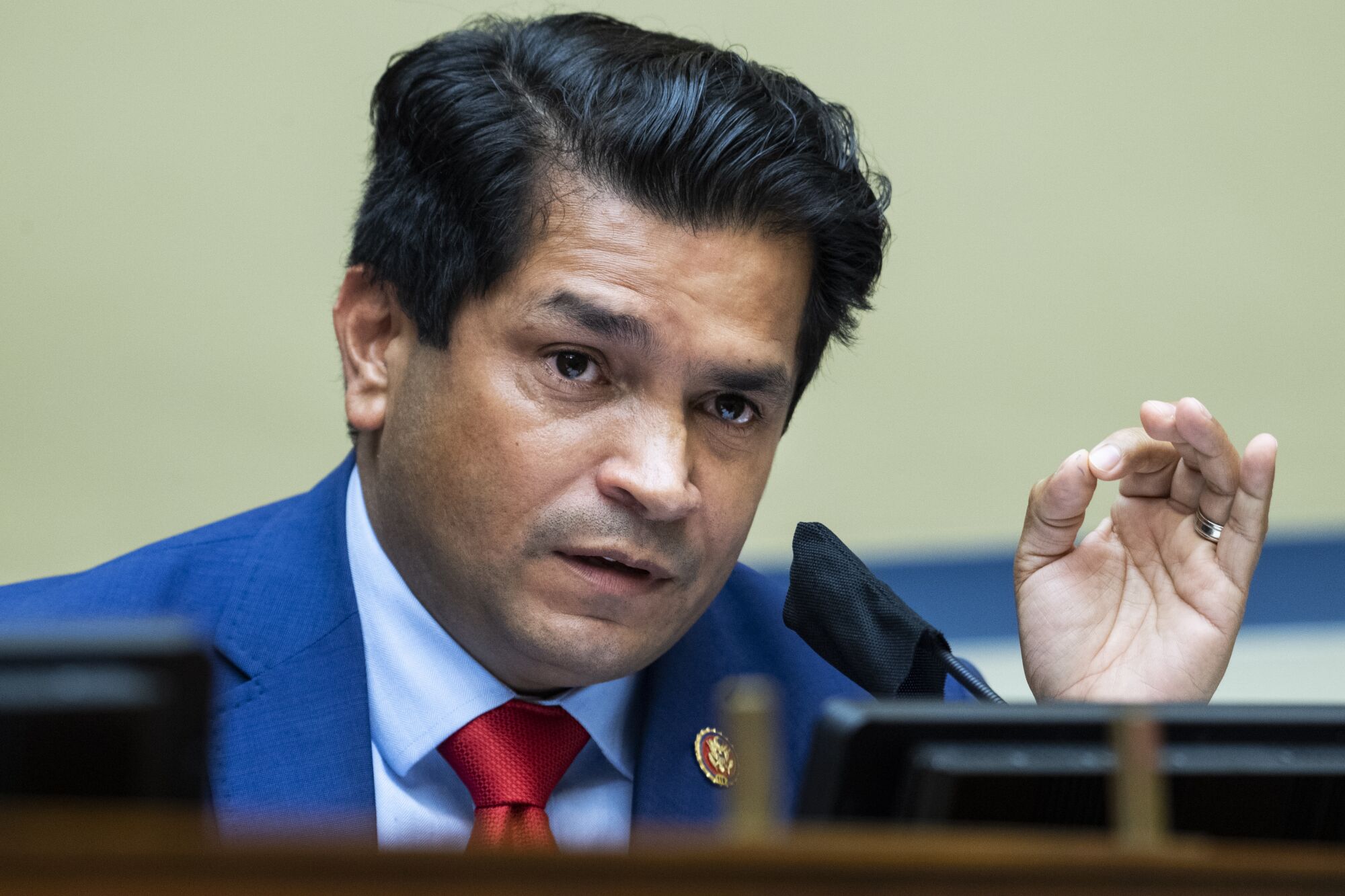 Rep. Jimmy Gomez questions a witness during a House committee hearing