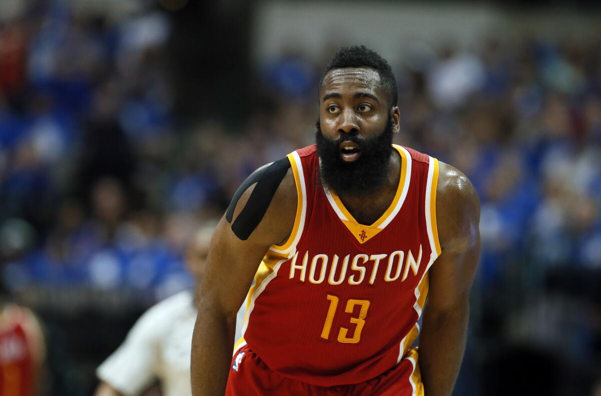 Houston's James Harden runs up court after sinking a basket against the Dallas Mavericks during Game 3 in their first-round playoff series on April 24 in Dallas.