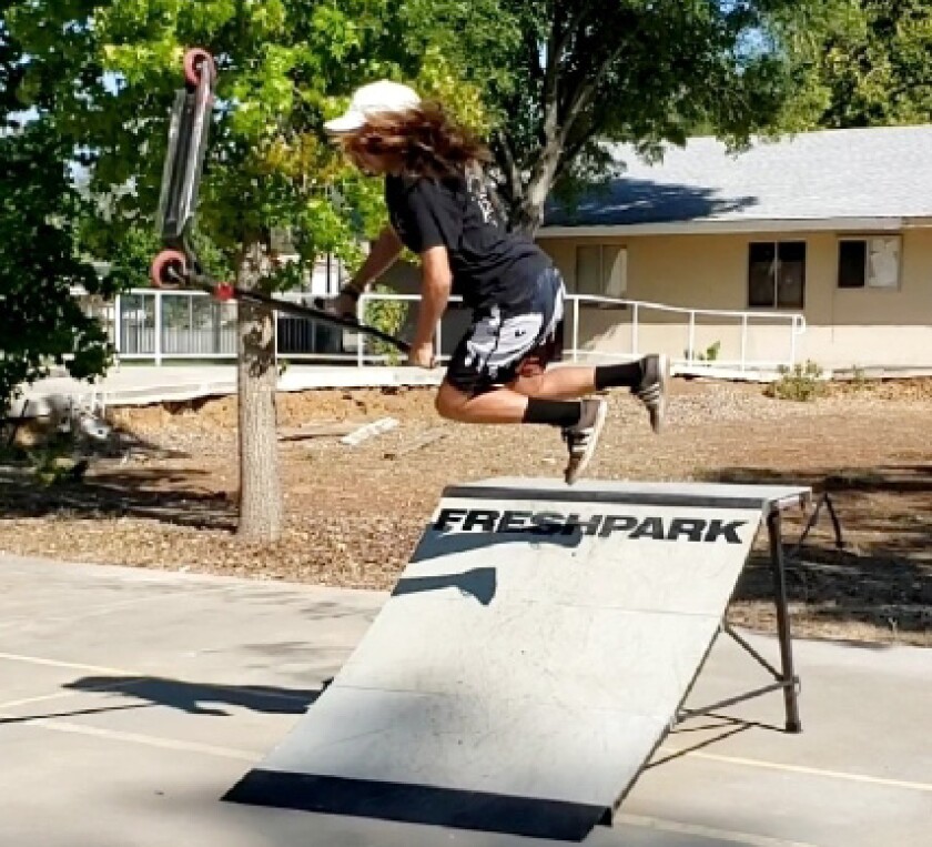 Aiden Zappias performs a midair ramp transition at the Skatepark Champions’ pop-up skatepark at 424 Letton St.