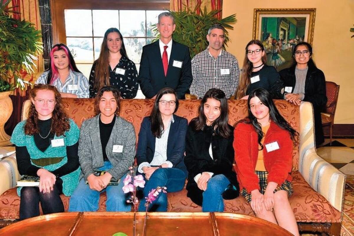 Canyon Crest Academy students and staff at the event with the author: (Standing): Amelia Bolaris, Abby Fraser, principal Brett Killeen, teacher Gary Malanga, Lily Pfeizer, Meghana Enugurthi. Seated: Rachael Cheverton, Zoe Sandberg Smith, author Casey Cep, Natalie Norton, Bella Braun