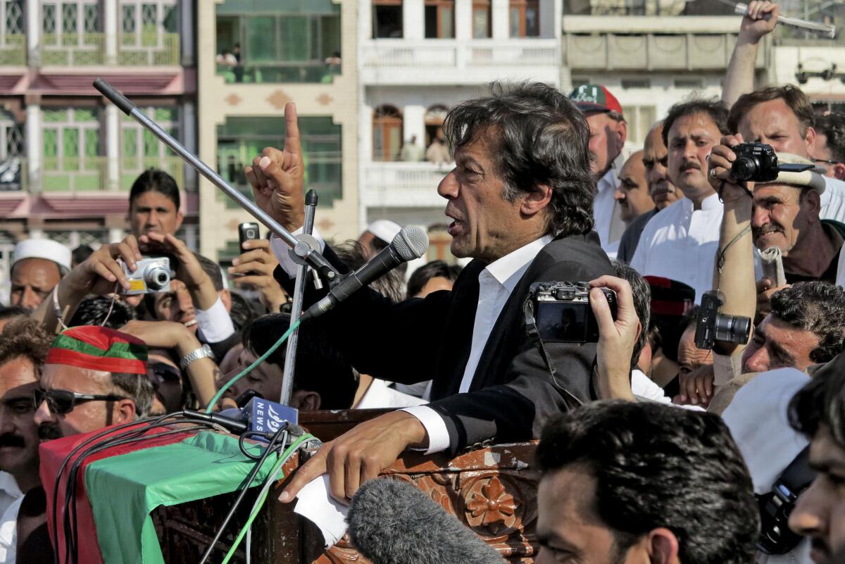 Pakistani cricket legend turned politician Imran Khan addresses supporters during a rally Sunday in the city of Mingora in northwestern Pakistan.