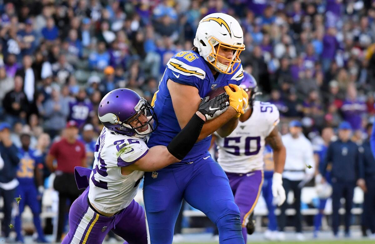 Chargers tight end Hunter Henry catches a pass against the Minnesota Vikings.