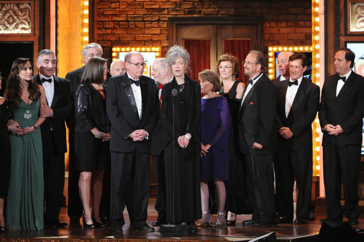 The cast and producers from "Who's Afraid of Virginia Woolf?" accept the award for best revival of a play.