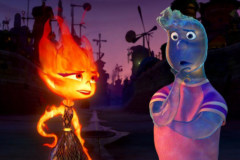 Ember (voiced by Leah Lewis) and Wade (Mamoudou Athie) in the movie “Elemental.”