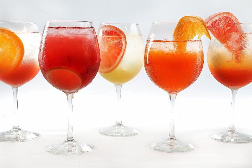 EL SEGUNDO, CA., AUGUST 24, 2018--for a story on Aperol spritzes and the different kinds you can make. Pictured (l to r) are , Bordiga, Genoaâs Contratto Bitters, Amaro Angelno, Aperol and Cappelletti Aperitivo. (Kirk McKoy / Los Angeles Times)