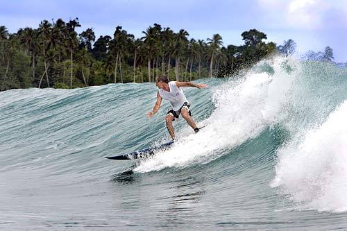Writer Joel Sappell in the Mentawai Islands: As the sports popularity has brought more crowds to well-known breaks, surfers are searching the globe for bigger and better waves they can ride in relative solitude.