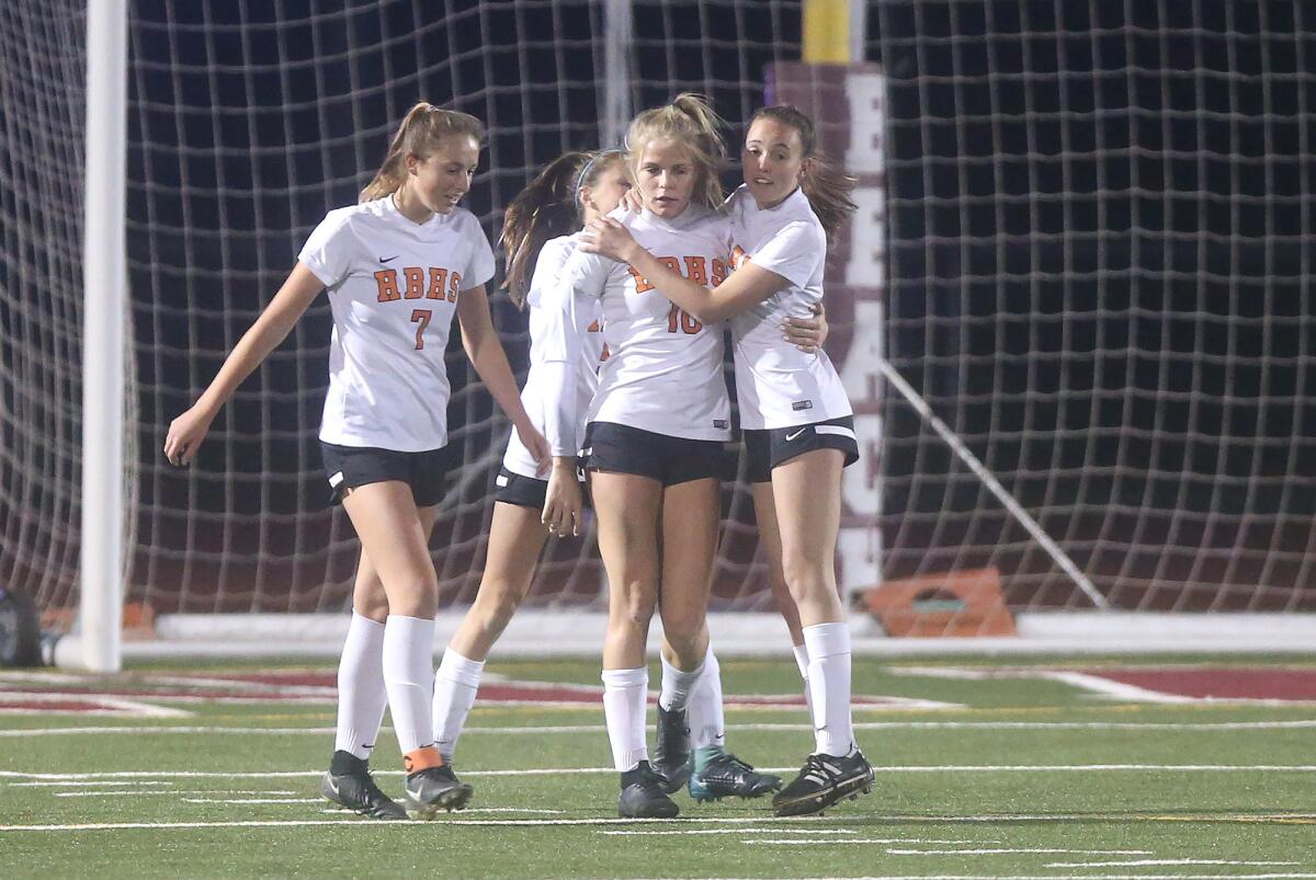 Huntington Beach High's Summer Stewart (10), pictured celebrating a goal in a Jan. 3, 2019 match against Laguna Beach, helped the Oilers to a 3-0 win over Marina.