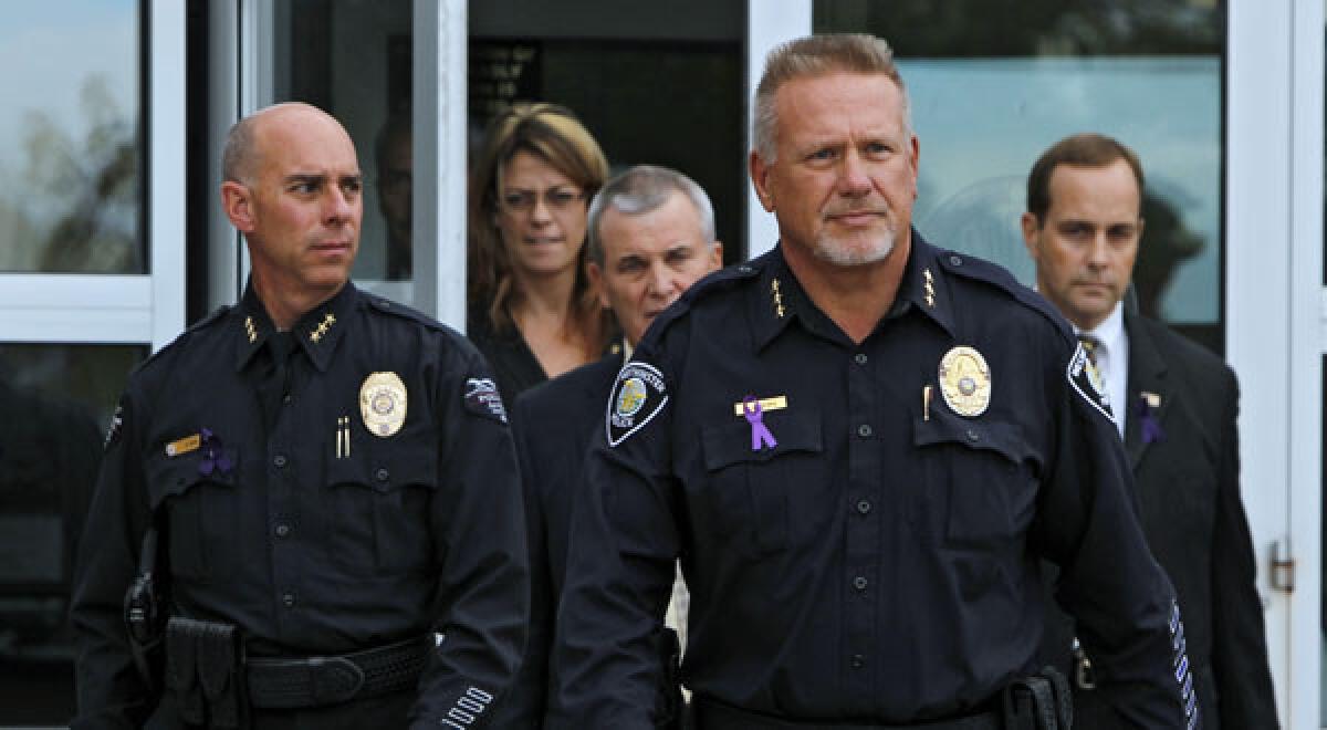 Westminster, Colo., Police Chief Lee Birk leads officials to a news conference last week where he announced that a body found in Arvada, Calif., was that of 10-year-old Jessica Ridgeway.