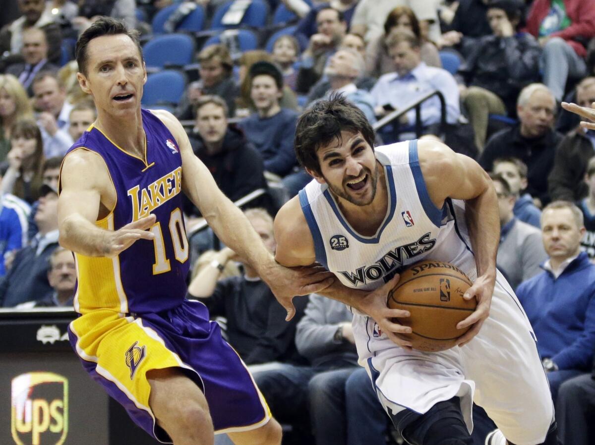 Minnesota's Ricky Rubio drives around Steve Nash in the first quarter Tuesday night, when Nash was still 39.