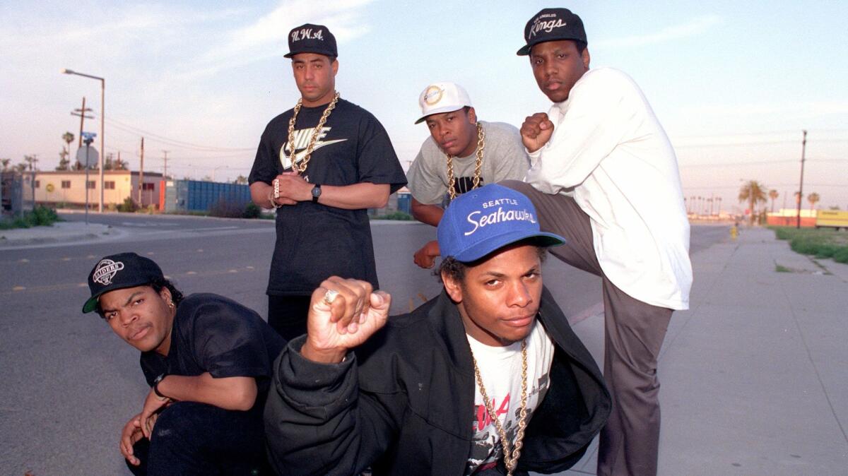 N.W.A on March 23, 1989: Ice Cube, far left; Eazy-E, center; standing from left, DJ Yella, Dr. Dre and MC Ren. (Douglas R. Burrows / Los Angeles Times)