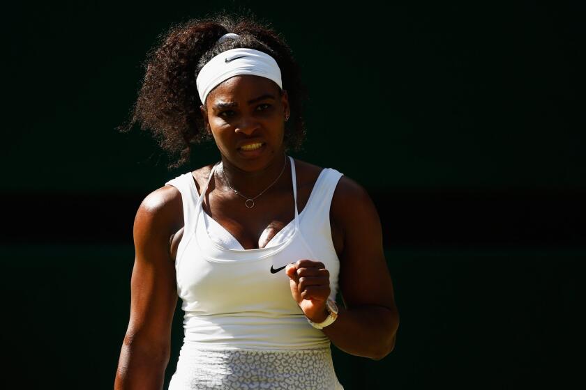 Serena Williams celebrates during her Wimbledon semifinal victory over Maria Sharapova on Thursday.