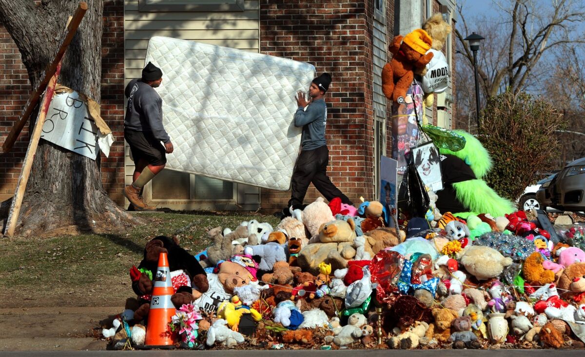 A resident of the Canfield Green apartments in Ferguson, Mo., who lived right above the spot where Michael Brown was killed, moved out on Nov. 19 in advance of a St. Louis county grand jury decision.