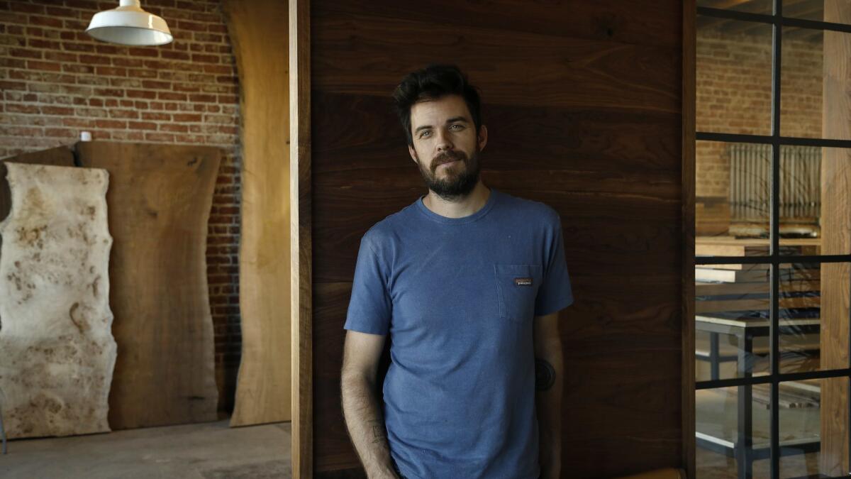 Furniture maker Josh Jackson in his Pasadena wood shop, Arbor Exchange.