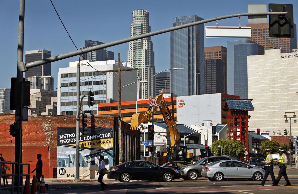 Construction began Tuesday on a rail project that will include a station at 1st and Central streets in Little Tokyo.