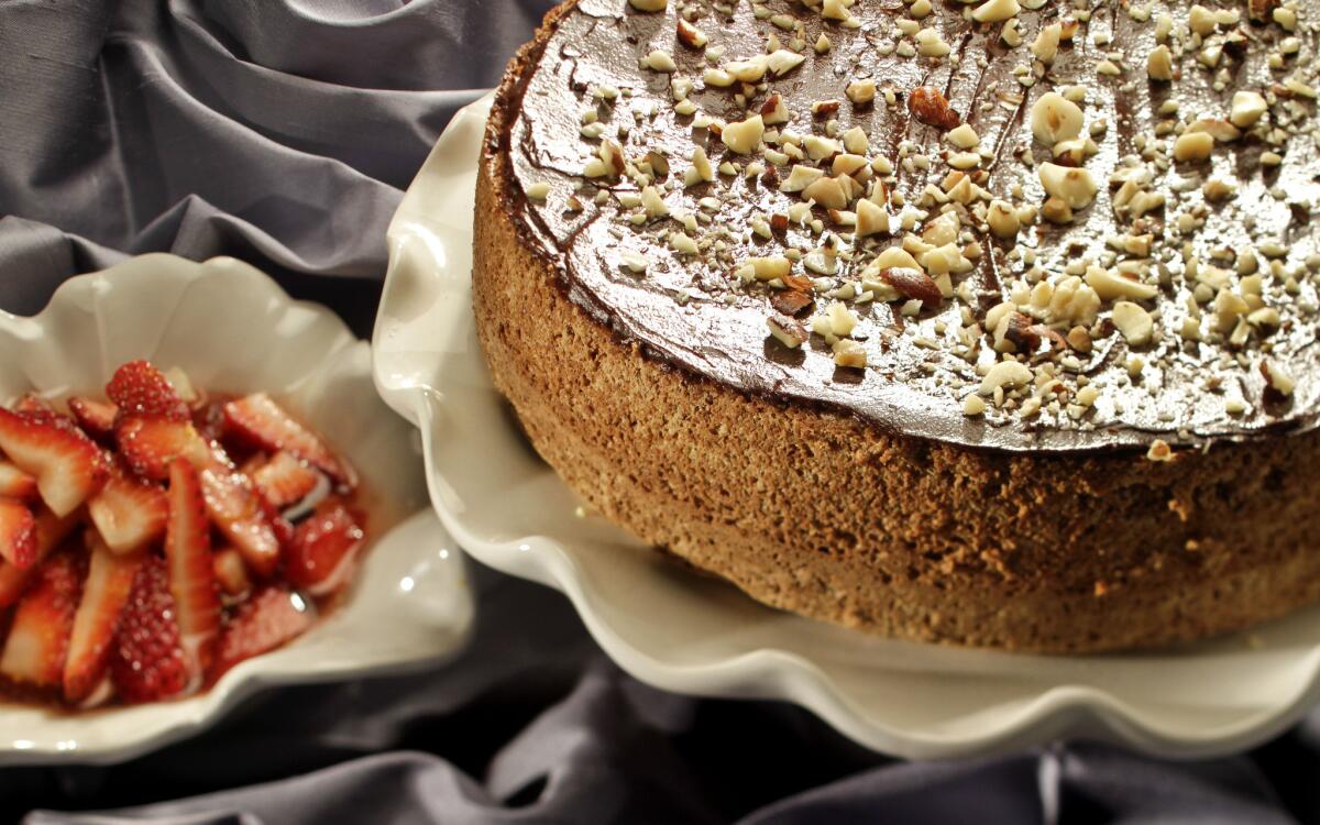 Chocolate-glazed nut torte with strawberries in Sephardi syrup