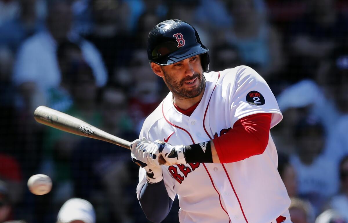 FILE -Boston Red Sox's J.D. Martinez plays against the Baltimore Orioles during the fifth inning of a baseball game, Sunday, May 29, 2022, in Boston. The Los Angeles Dodgers and designated hitter J.D. Martinez agreed to a $10 million, one-year contract on Saturday, Dec. 17, 2022 according to a person familiar with the negotiations.(AP Photo/Michael Dwyer, File)