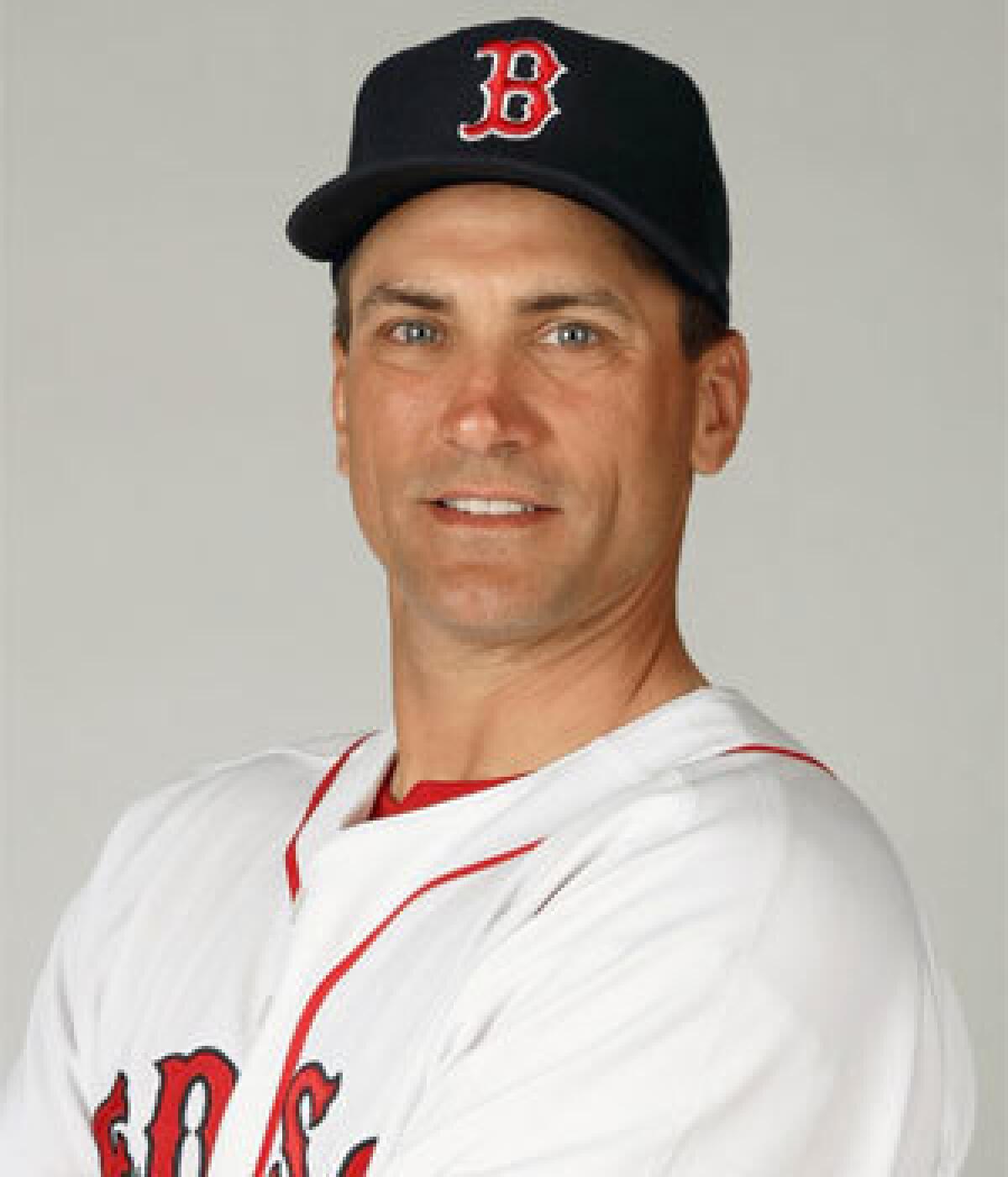 Tim Bogar, shown in 2009 when he was with the Boston Red Sox, has left the Angels' double-A Arkansas team to become the Texas Rangers' bench coach.