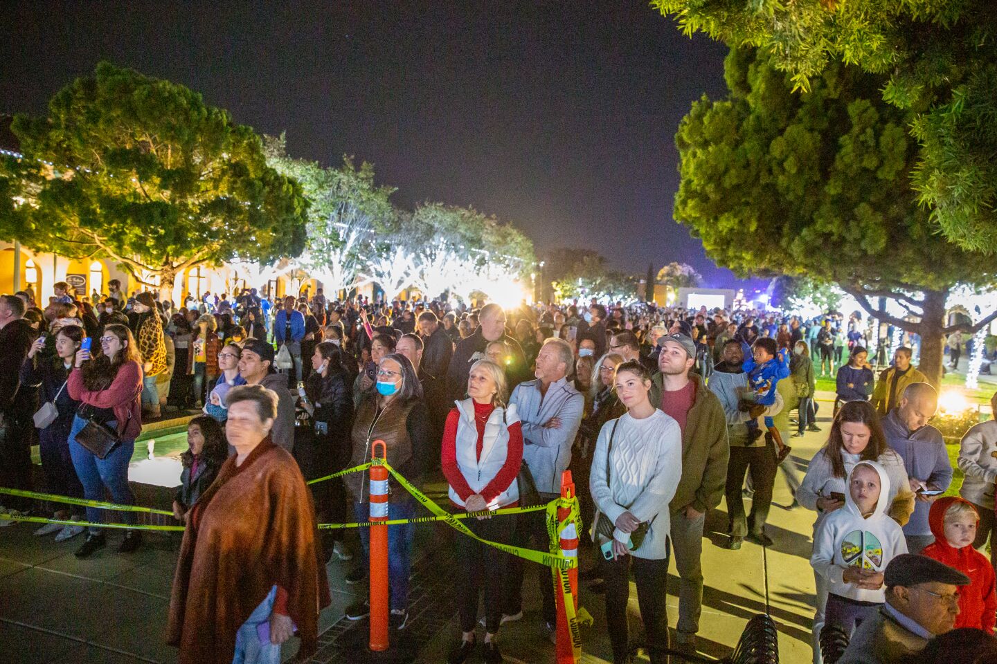 People eager to kick off the holidays with Liberty Station's tree lighting stretch along the North Promenade on Nov. 26.
