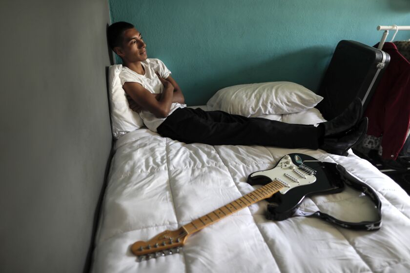 PASADENA, CA, WEDNESDAY, AUGUST 7, 2019 - The young singer and songwriter Jasper Bones makes delicate love songs that he sings in a mix of English and Spanish. He is photographed in his bedroom/studio. (Robert Gauthier/Los Angeles Times)