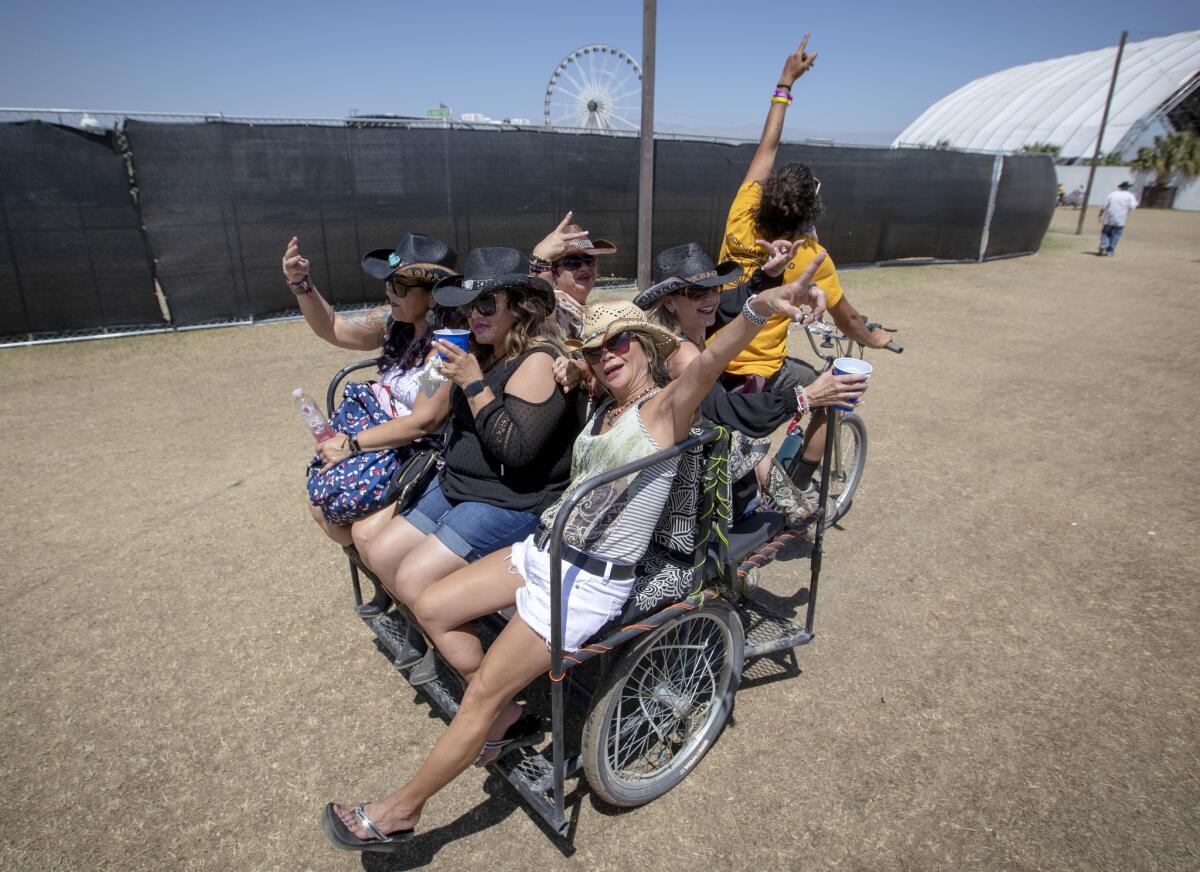 A group of women get a lift on the final day of Stagecoach 2018.