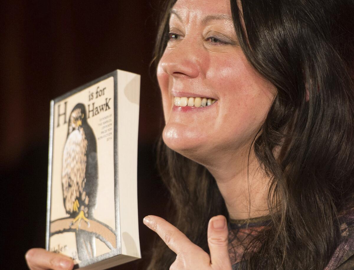 Winning author Helen Macdonald with her book "H is for Hawk," winner of the 2015 Costa Book Award.