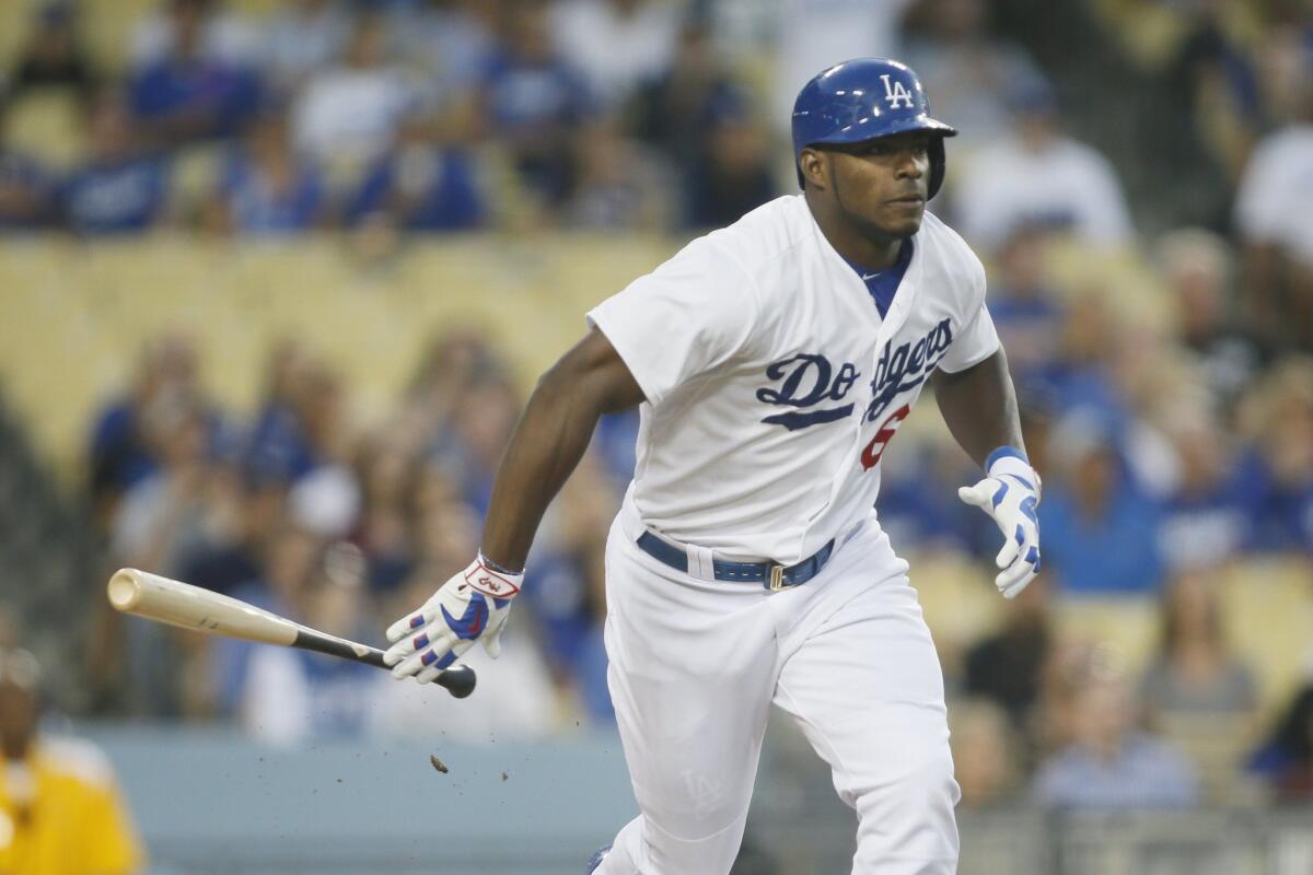 The Dodgers' Yasiel Puig singles against San Diego on Oct. 3.