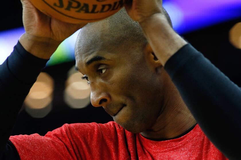 Lakers star Kobe Bryant warms up before a game against the New Orleans Pelicans on Jan. 21.