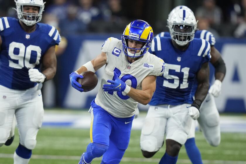 Los Angeles Rams' Cooper Kupp (10) runs during the second half of an NFL football game.
