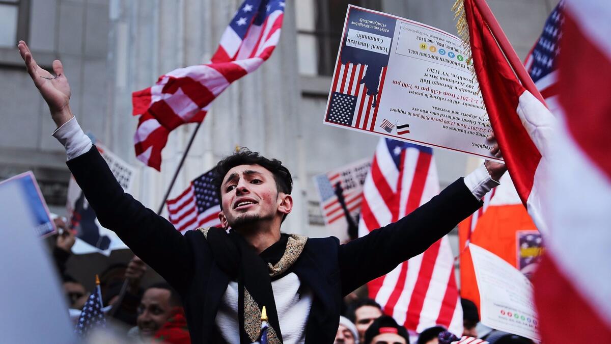 Ethnic Yemenis and supporters in New York protest President Trump's orders on immigration and refugees.