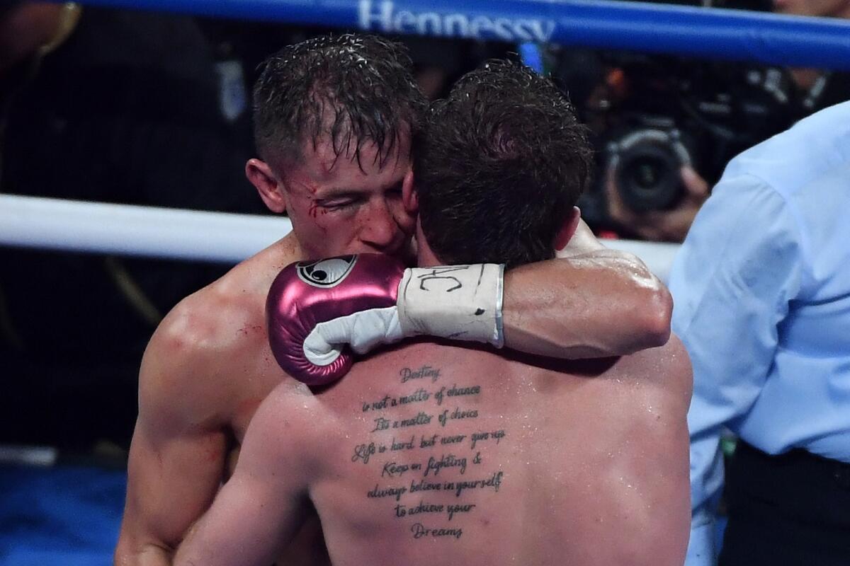 Gennady Golovkin (L) and Canelo Alvarez talk following their WBC/WBA middleweight title fight at T-Mobile Arena on September 15, 2018 in Las Vegas, Nevada.
