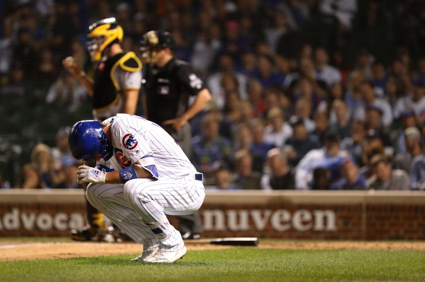 Cubs batter Kris Bryant reacts after being hit by a pitch in the fourth inning against the Pirates at Wrigley Field on Sept. 25, 2018.