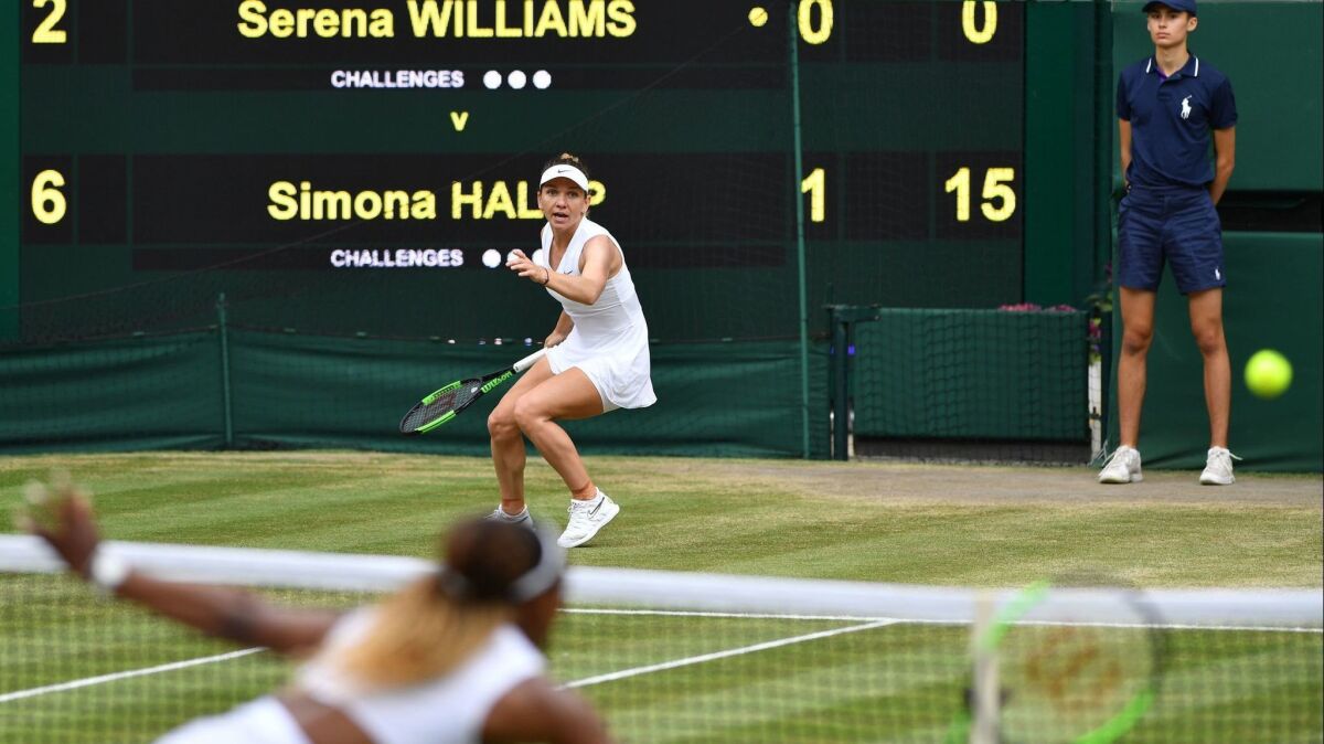 Simona Halep watches Serena Williams return a shot during their women's final at Wimbledon on Saturday.
