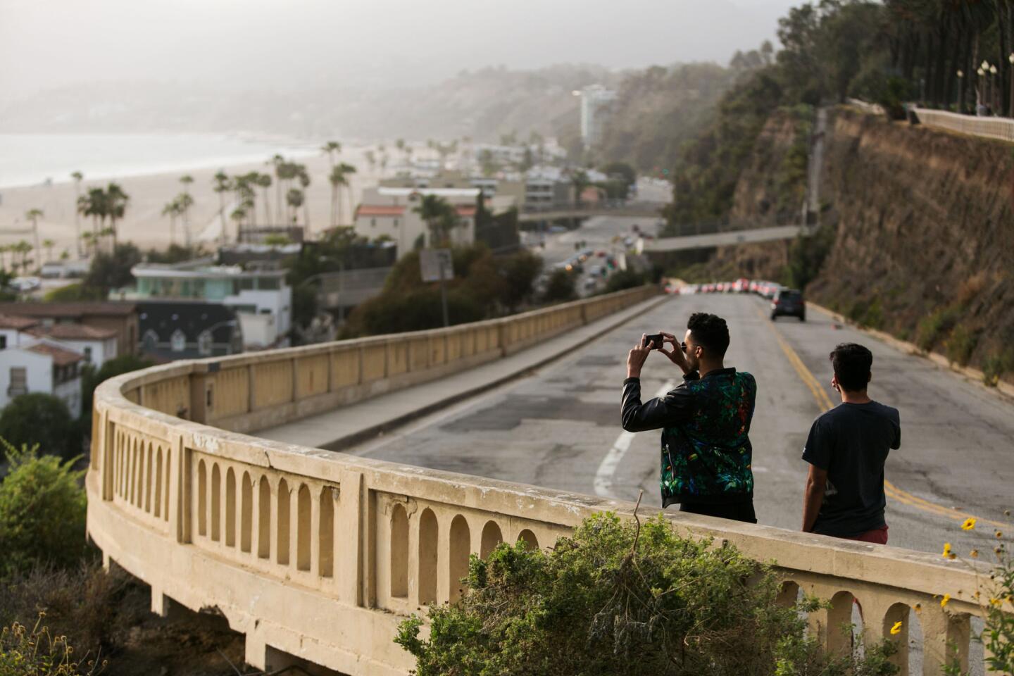 A man takes a picture from the California Incline in Santa Monica on Wednesday.
