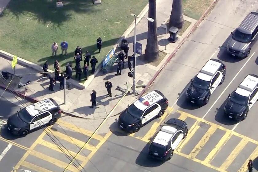 LAPD officers at Hollywood High School, where they were responding to a call about an assault with a deadly weapon.