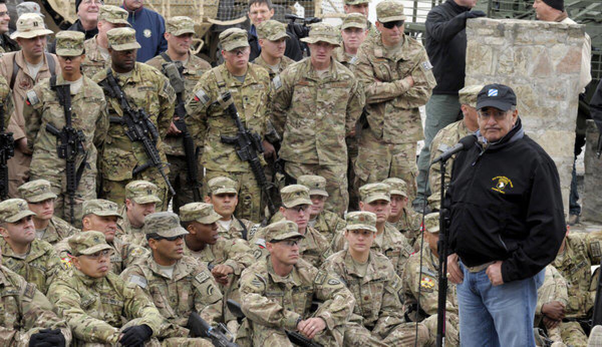 U.S. Defense Secretary Leon E. Panetta speaks to the troops Thursday during a visit to Kandahar Airfield in Kandahar, Afghanistan. He was not at the airbase at the time of the nearby suicide bombing.