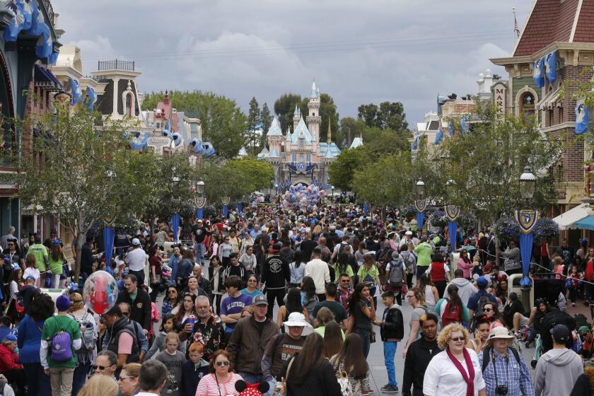 ANAHEIM, CA-MAY 22, 2015: Sleeping Beauty Castle and Main Street U.S.A. are adorned with diamond-studied decorations as large crowds take part in Disneyland 24-hour event to start its 60th anniversary Diamond Celebration Friday, May 22, 2015. The summer spectacular features a new Paint The Night parade, Disneyland Forever fireworks display and ``World of Color-Celebrate!'' shows. As part of the festivities, Sleeping Beauty Castle at Disneyland Park and Carthay Circle Theatre at Disney California Adventure Park are adorned with diamonds. (Photo By Allen J. Schaben / Los Angeles Times)
