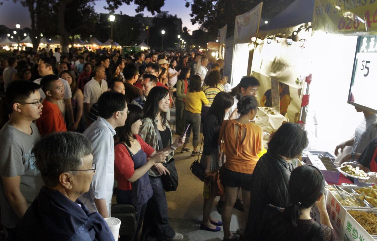Food stalls draw crowds at the 626 Night Market in Pasadena.