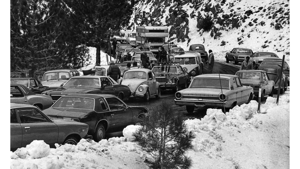 Jan. 15, 1978: Traffic stalls on Angeles Crest Highway as the California Highway Patrol stops cars without chains. This was at 7,000 foot altitude, west of the Mt. Waterman ski lift.