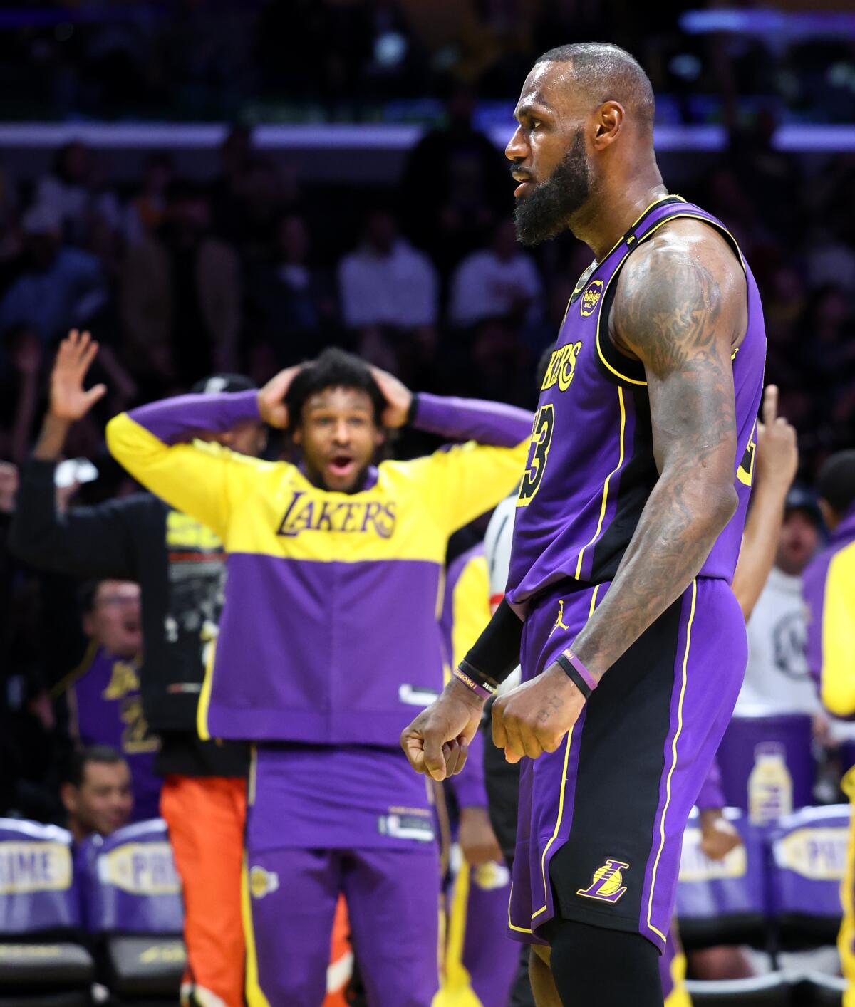 A player celebrates a dunk.