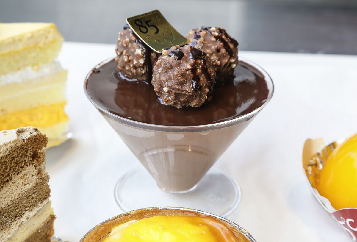 One of the standouts at 85°C  is the multi-textured royal chocolate cup. Here's it's surrounded by the mango delight, the Portuguese egg tart, coffee crème brûlée cake and mango crème brûlée cake.
